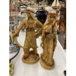 TWO VERY HEAVY SHEIKH AND ARAB LADY FIGURES, HEIGHT 31CM