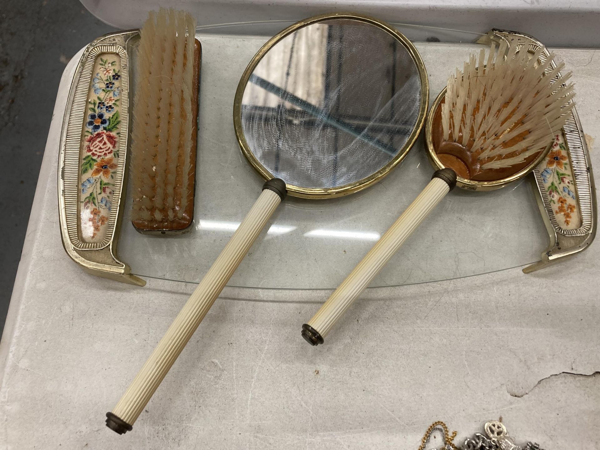A VINTAGE PETIT-POINT BRUSH AND MIRROR SET ON A GLASS TRAY - Image 4 of 4