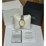 A GENTS ROTARY WRIST WATCH WITH PAPERWORK AND ORIGINAL BOX