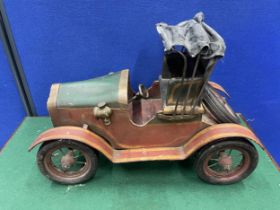A VINTAGE FRENCH METAL MODEL CAR 19 INCHES LONG