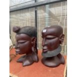 TWO VINTAGE HEAVY WOODEN TRIBAL BUSTS