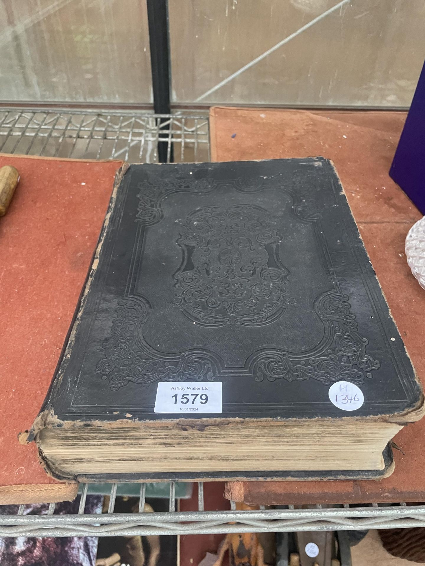 A VINTAGE LEATHER BOUND HOLY BIBLE