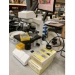 A MODERN ELECTRIC MICROSCOPE WITH SLIDES SEEN WORKING BUT NO WARRANTY