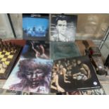 SIX VARIOUS VINYL RECORDS TO INCLUDE GENESIS AND NEW ORDER ETC