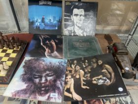 SIX VARIOUS VINYL RECORDS TO INCLUDE GENESIS AND NEW ORDER ETC