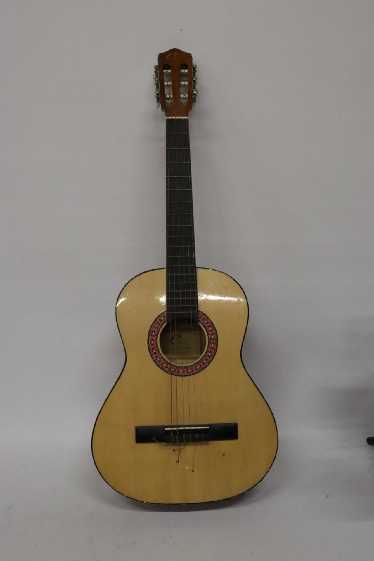 AN ELECA ACOUSTIC GUITAR