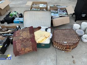 A WICKER BASKET AND A SUITCASE CONTAINING VARIOUS MATERIAL