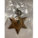 A BRITISH WORLD WAR 11 STAR MEDAL