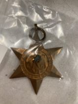 A BRITISH WORLD WAR 11 STAR MEDAL