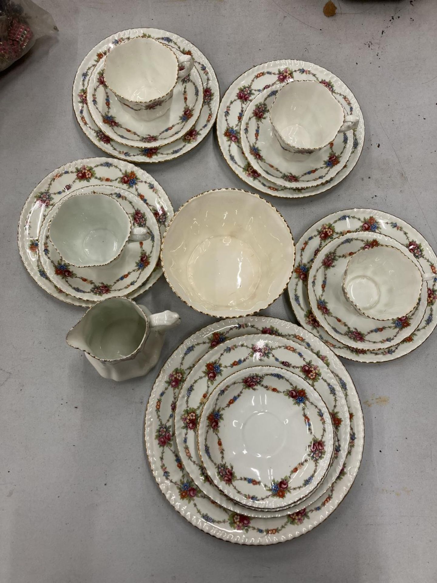 AN ANTIQUE CHINA PART TEASET TO INCLUDE A CAKE PLATE, SUGAR BOWL, CREAM JUG, CUPS, SAUCERS AND - Image 2 of 3