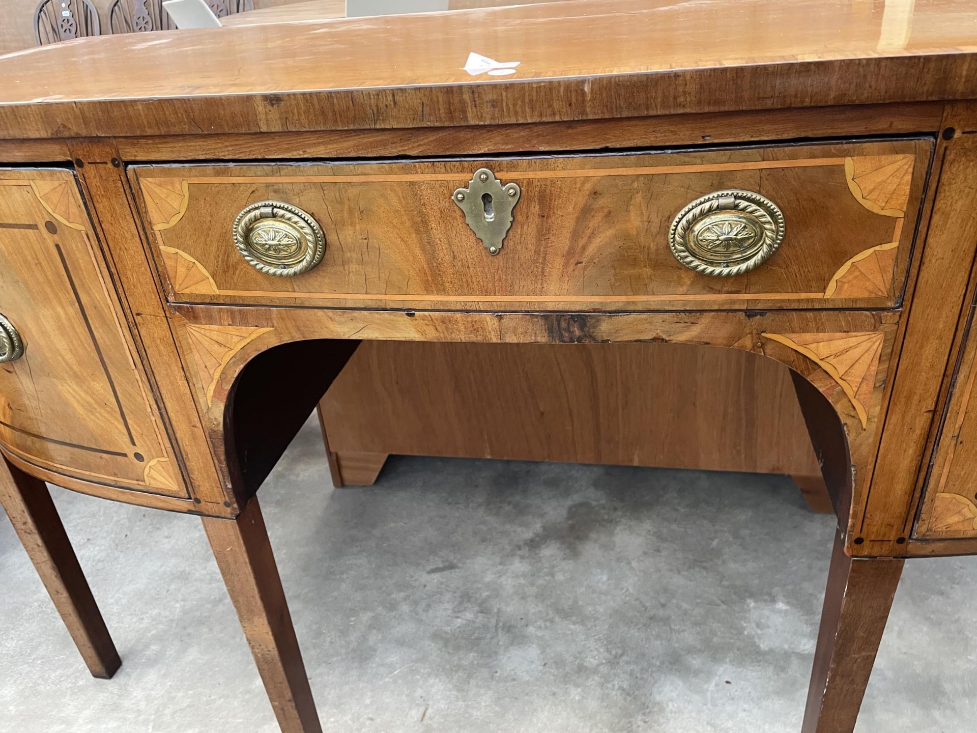 A 19TH CENTURY MAHOGANY INLAID AND CROSSBANDED BOWFRONTED SIDEBOARD ENCLOSING THREE DRAWERS, 60" - Image 6 of 7