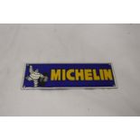 AN OBLONG MICHELIN SIGN - 30 X 11 CM