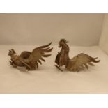 A PAIR OF VINTAGE WHITE METAL FIGHTING COCK FIGURES