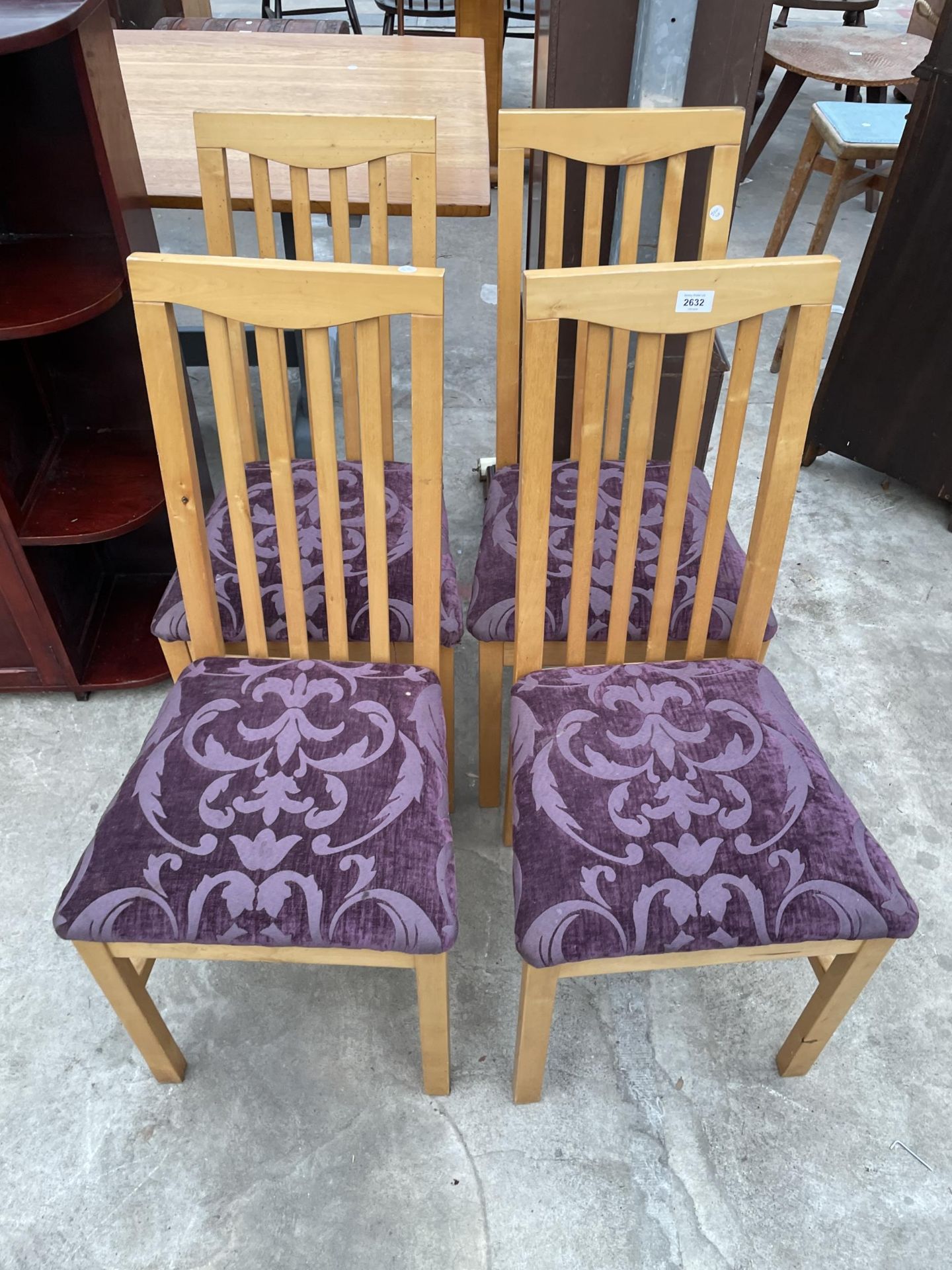 A SET OF FOUR MODERN DINING CHAIRS