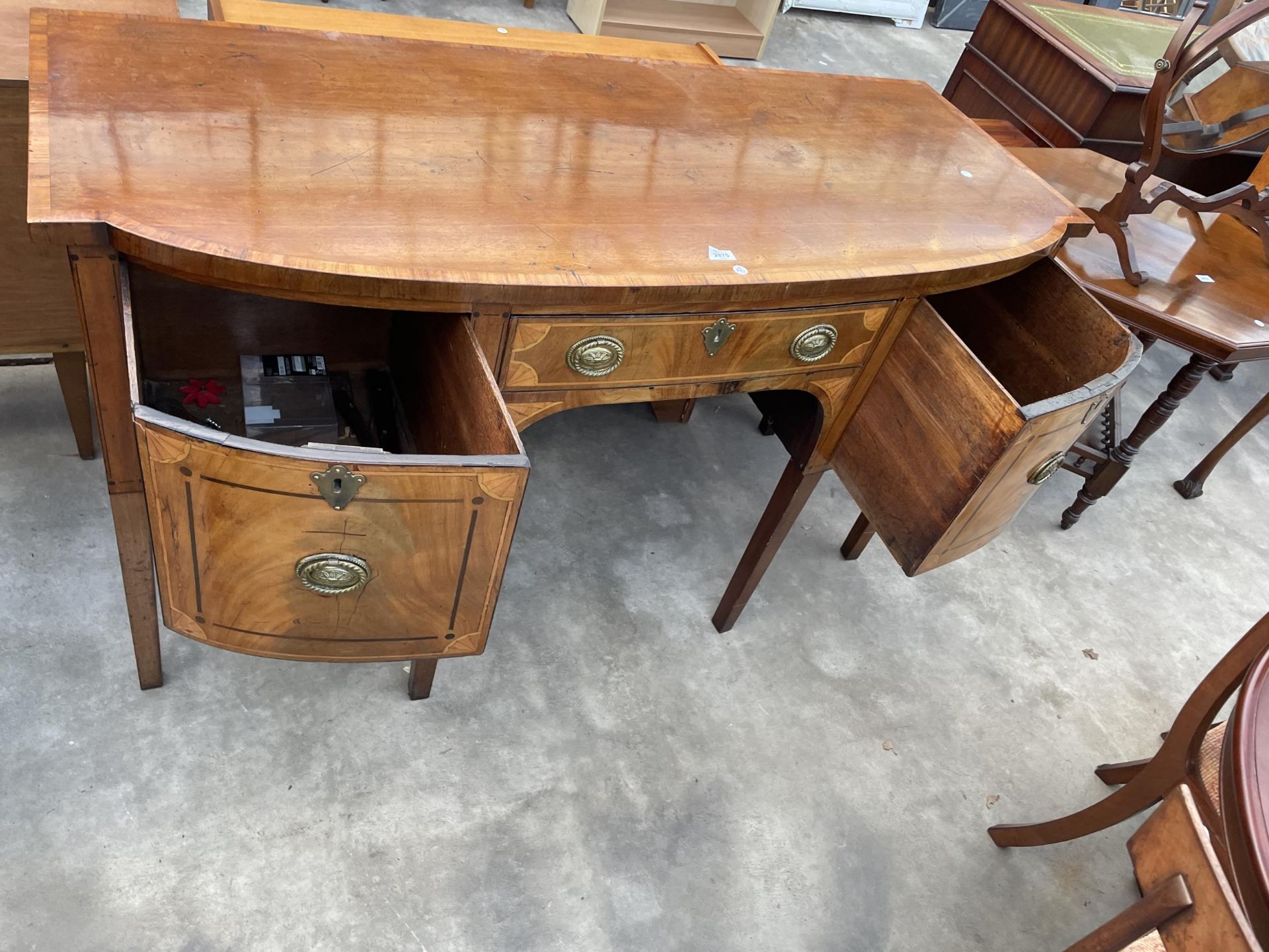 A 19TH CENTURY MAHOGANY INLAID AND CROSSBANDED BOWFRONTED SIDEBOARD ENCLOSING THREE DRAWERS, 60" - Image 7 of 7