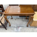 A MAHOGANY SIDE TABLE WITH LIFT-UP TOP SECTION ON CABRIOLE LEGS WITH CLAW FEET, 36 X 20"