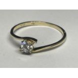 A 9 CARAT GOLD RING WITH A SOLITAIRE CUBIC ZIRCONIA SIZE J