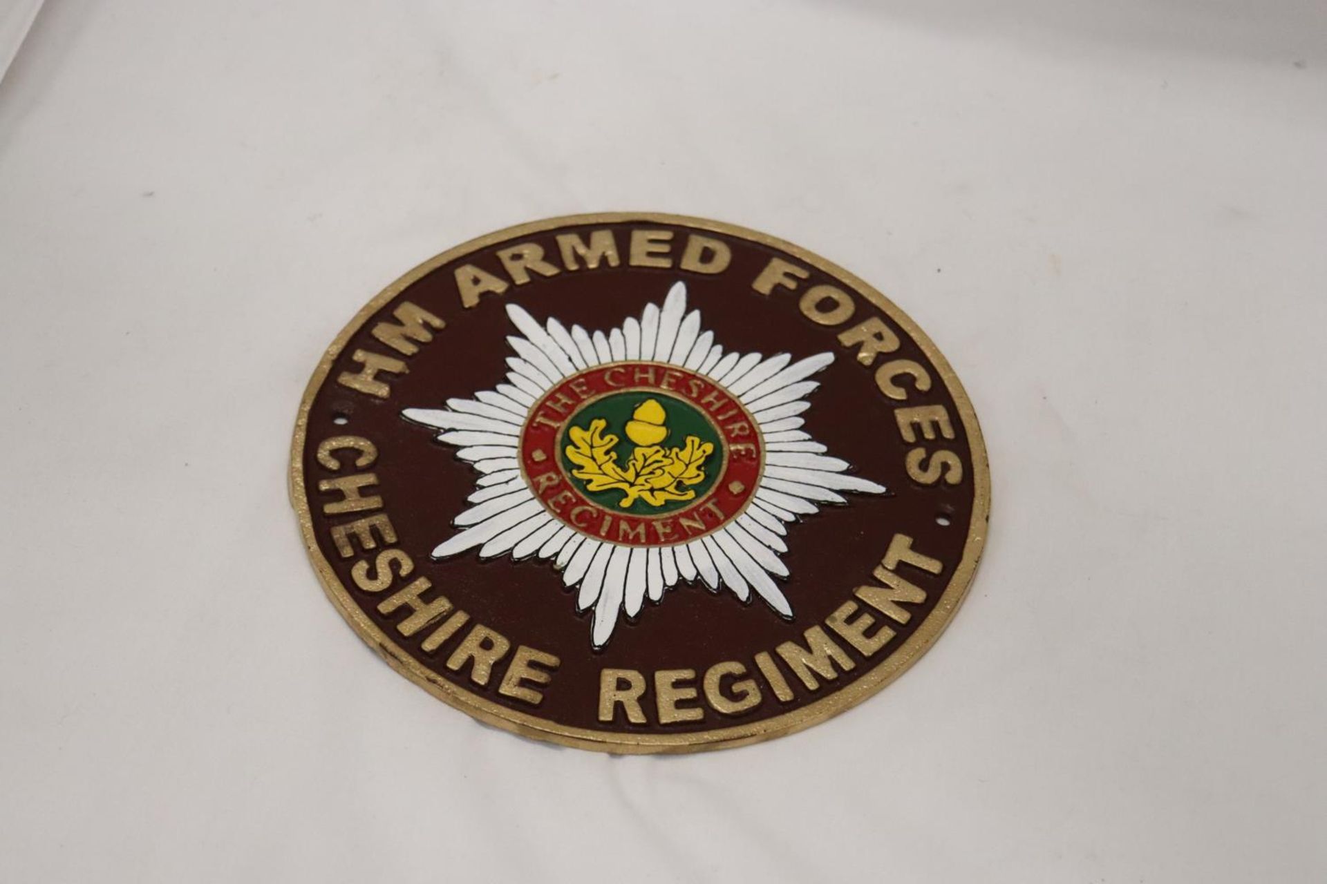 A CAST ARMED FORCES, CHESHIRE SIGN, DIAMETER 23CM