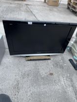 A PANASONIC 32" TELEVISION WITH REMOTE CONTROL