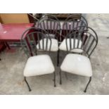 A SET OF FOUR MODERN METAL FRAMED DINING CHAIRS WITH UPHOLSTERED SEATS