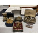 A QUANTITY OF CUFFLINKS, TIE PINS AND MILITARY BADGES