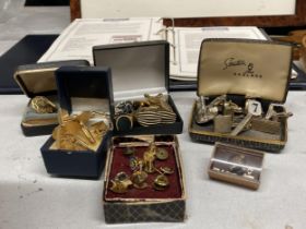 A QUANTITY OF CUFFLINKS, TIE PINS AND MILITARY BADGES