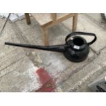 A VINTAGE LONG SPOUTED WATERING CAN