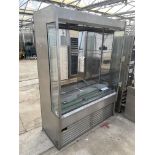 A STAINLESS STEEL INDUSTRIAL DSISPLAY FRIDGE