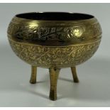 A VINTAGE MIDDLE EASTERN BRASS TRIPOD CENSOR / POT, HEIGHT 10CM