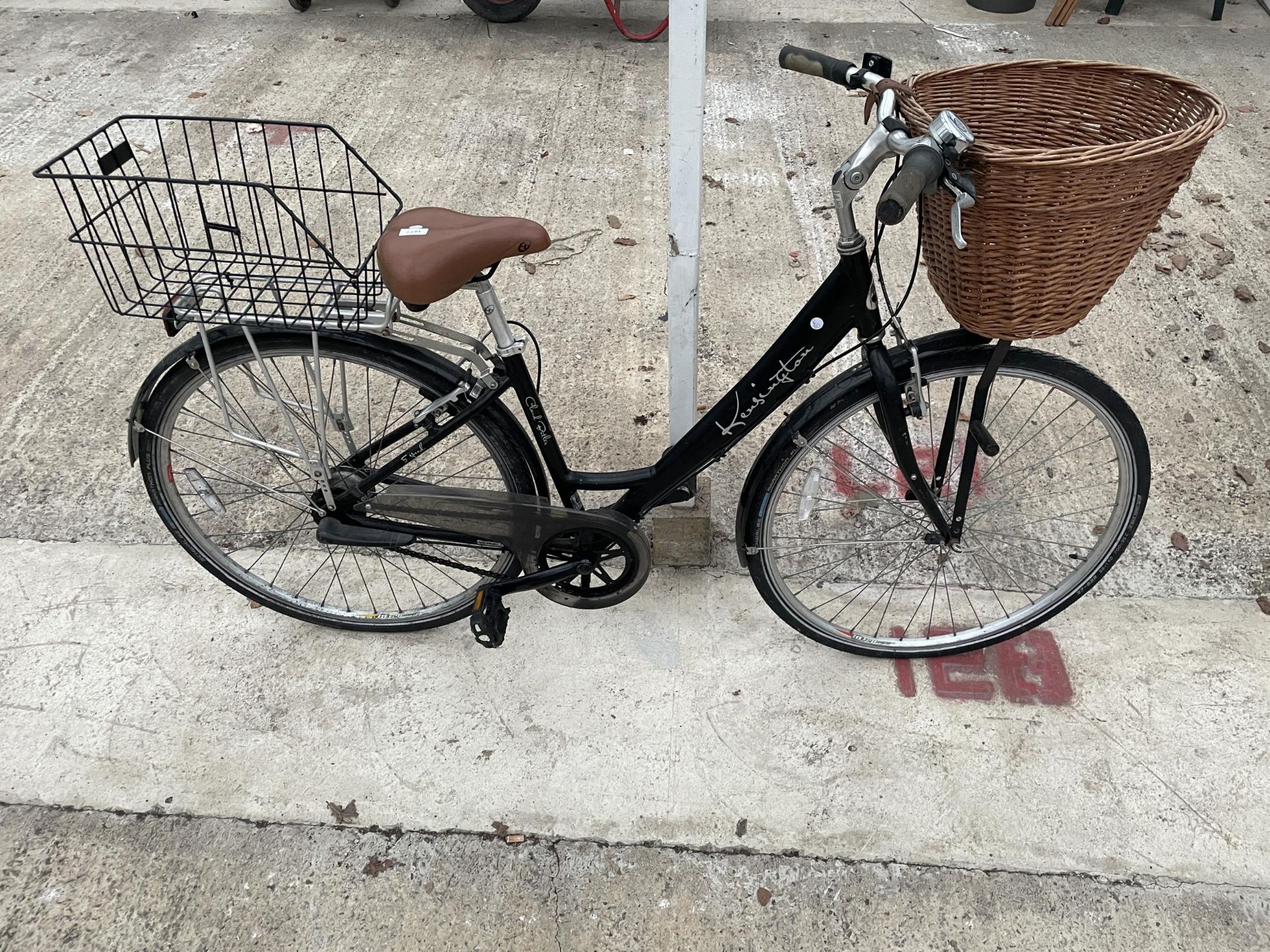 A LADIES CLAUD BUTLER KENSINGTON BIKE WITH WICKER BASKET