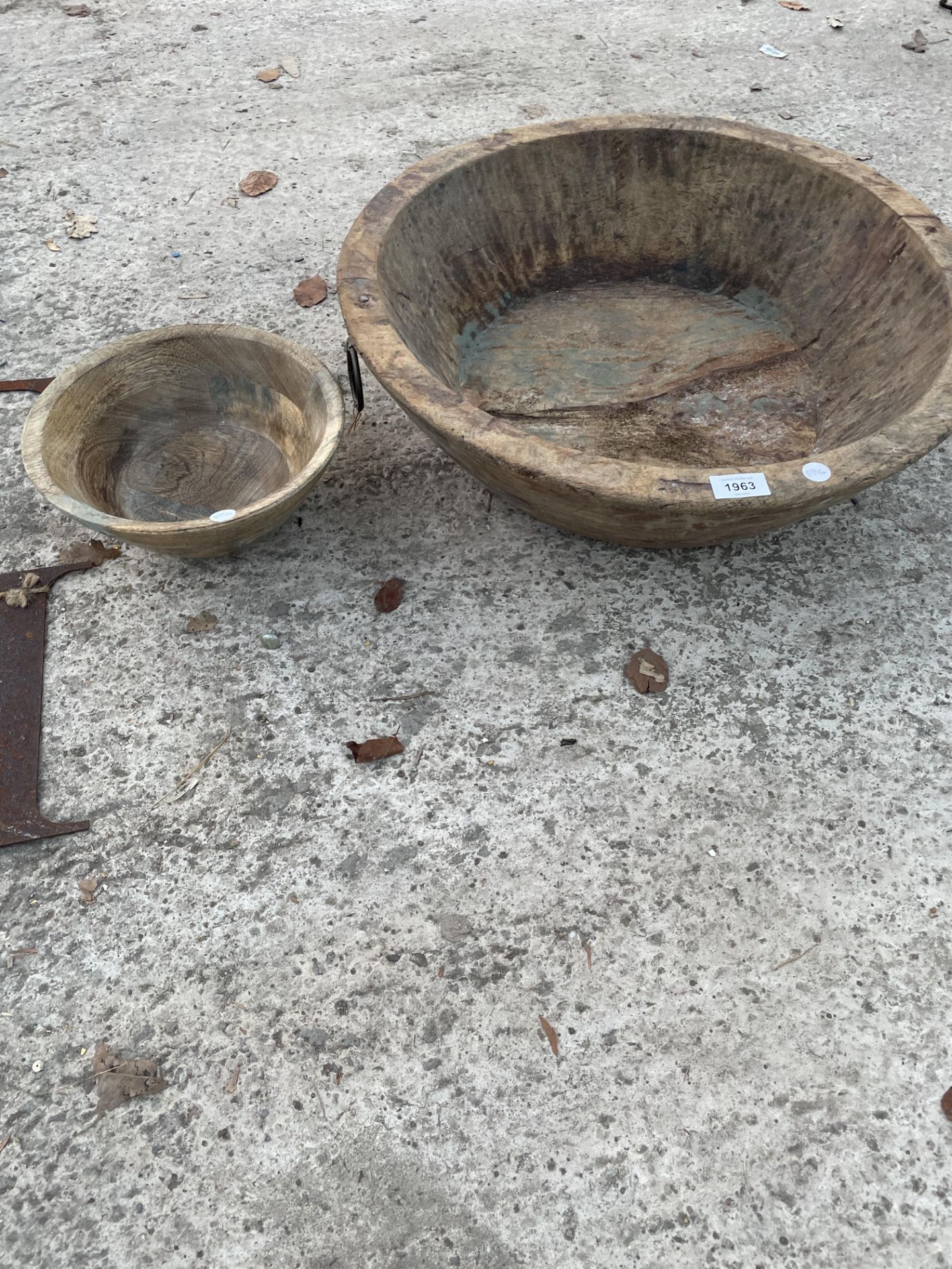 A LARGE VINTAGE TREEN BOWL AND A FURTHER SMALLER TREEN BOWL