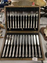 A CASED CANTEEN OF FISH KNIVES AND FORKS