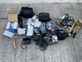 AN ASSORTMENT OF ITEMS TO INCLUDE A CANON CAMCORDER, DIGITAL CAMERAS AND CABLES ETC