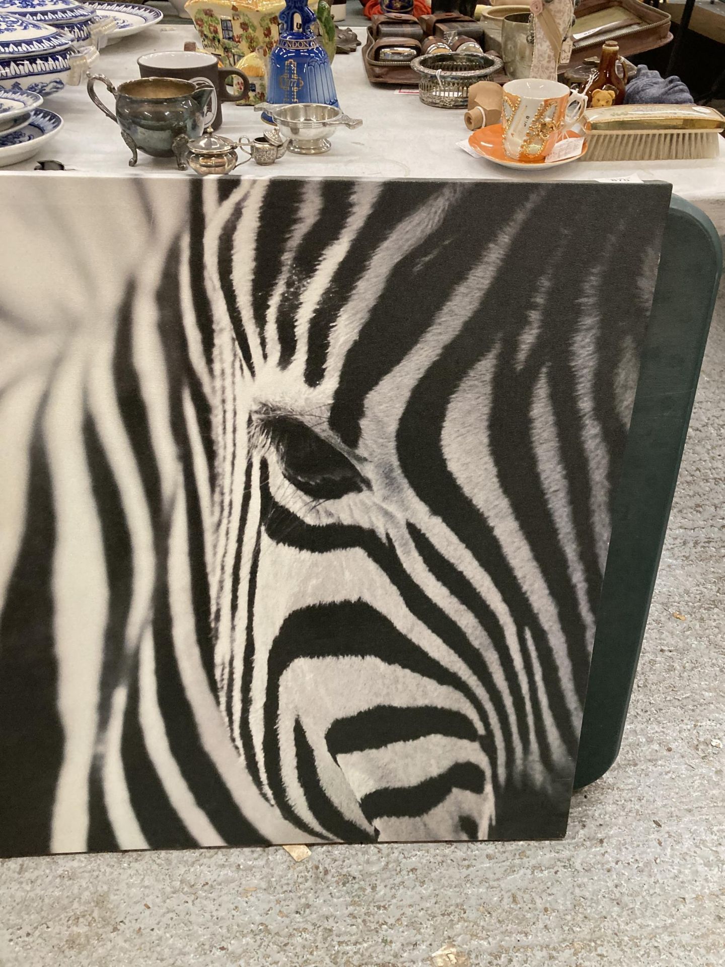 A LARGE PRINT ON CANVAS OF A ZEBRA, 118CM X 79CM - Image 2 of 2