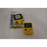 A BOXED GAMEBOY COLOUR, PORTABLE HANDHELD GAMES CONSOLE