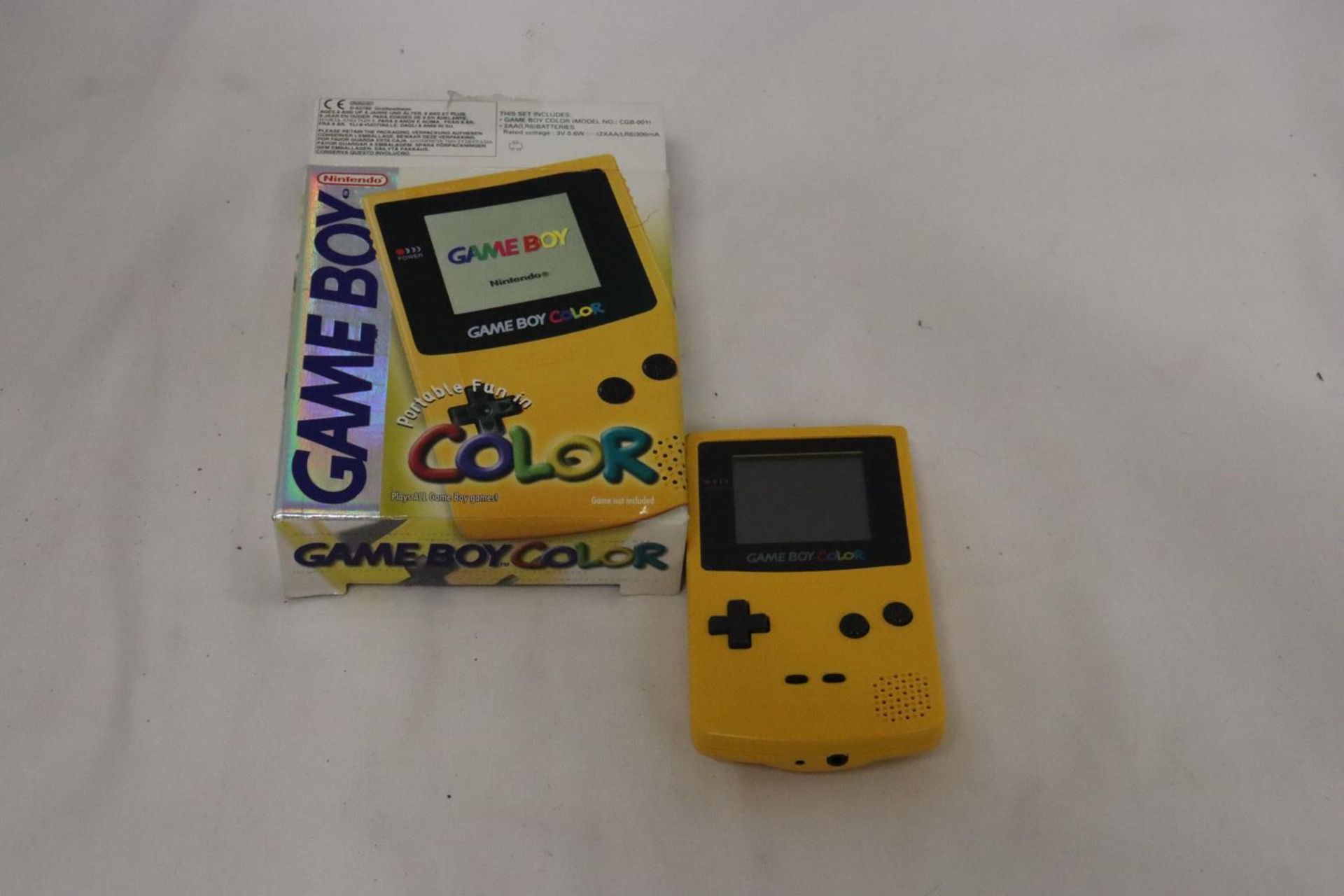 A BOXED GAMEBOY COLOUR, PORTABLE HANDHELD GAMES CONSOLE