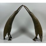 A PAIR OF VINTAGE HORN EFFECT BIRD FIGURES, HEIGHT 29 CM