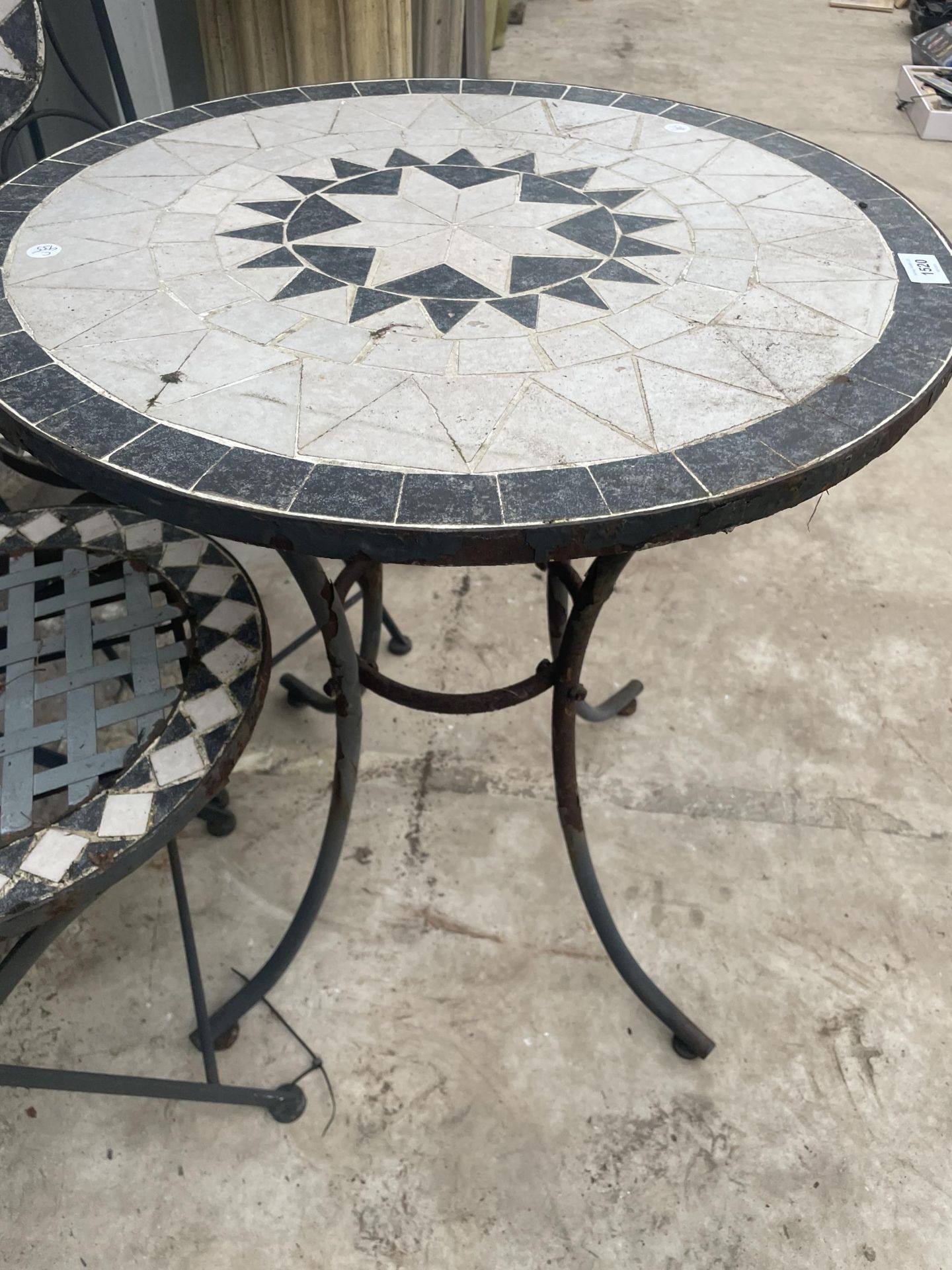 A METAL AND TILED BISTRO SET COMPRISING OF A ROUND TABLE AND TWO CHAIRS - Image 3 of 3