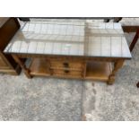 A MODERN OAK COFFEE TABLE ENCLOSING TWO DRAWERS, 40 X 19"