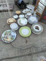 A LARGE ASSORTMENT OF CERAMICS TO INCLUDE PLATES AND CUPS ETC