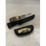 TWO CASED KNIVES TO INCLUDE A BONE HANDLED HUNTING KNIFE AND A DECORATIVE STAG DESIGN POCKET KNIFE