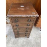 A MINIATURE MAHOGANY CHEST OF SIX DRAWERS, 12" WIDE