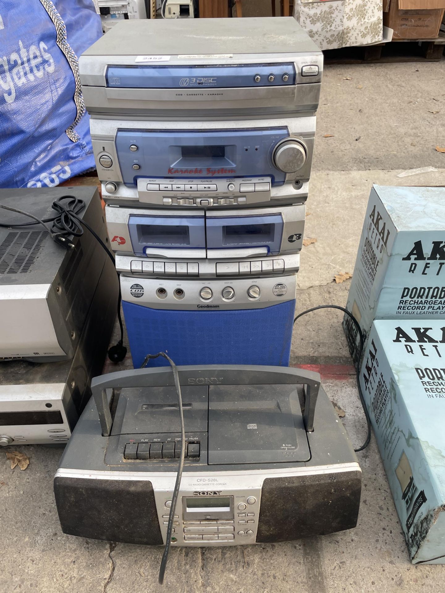 A SONY RADIO AND A GOODMANS STEREO SYSTEM