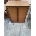 A LEGATE FURNITURE RETRO TEAK CABINET WITH FOLDING STORAGE DOORS, 25" WIDE (48" OPENED)