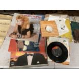 A QUANTITY OF LP'S AND SINGLES TO INCLUDE CYNDI LAUPER, NAT KING COLE, PAUL ANKA, ETC.,