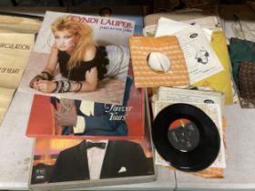 A QUANTITY OF LP'S AND SINGLES TO INCLUDE CYNDI LAUPER, NAT KING COLE, PAUL ANKA, ETC.,