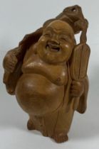 A VINTAGE CARVED WOODEN MODEL OF A BUDDHA, HEIGHT 14 CM