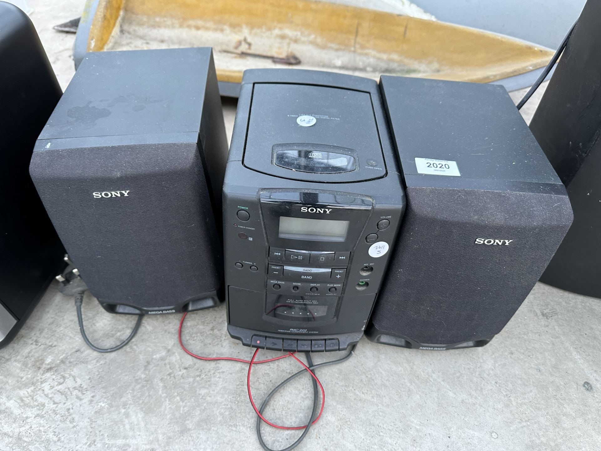 A SONY STEREO SYSTEM WITH TWO SPEAKERS