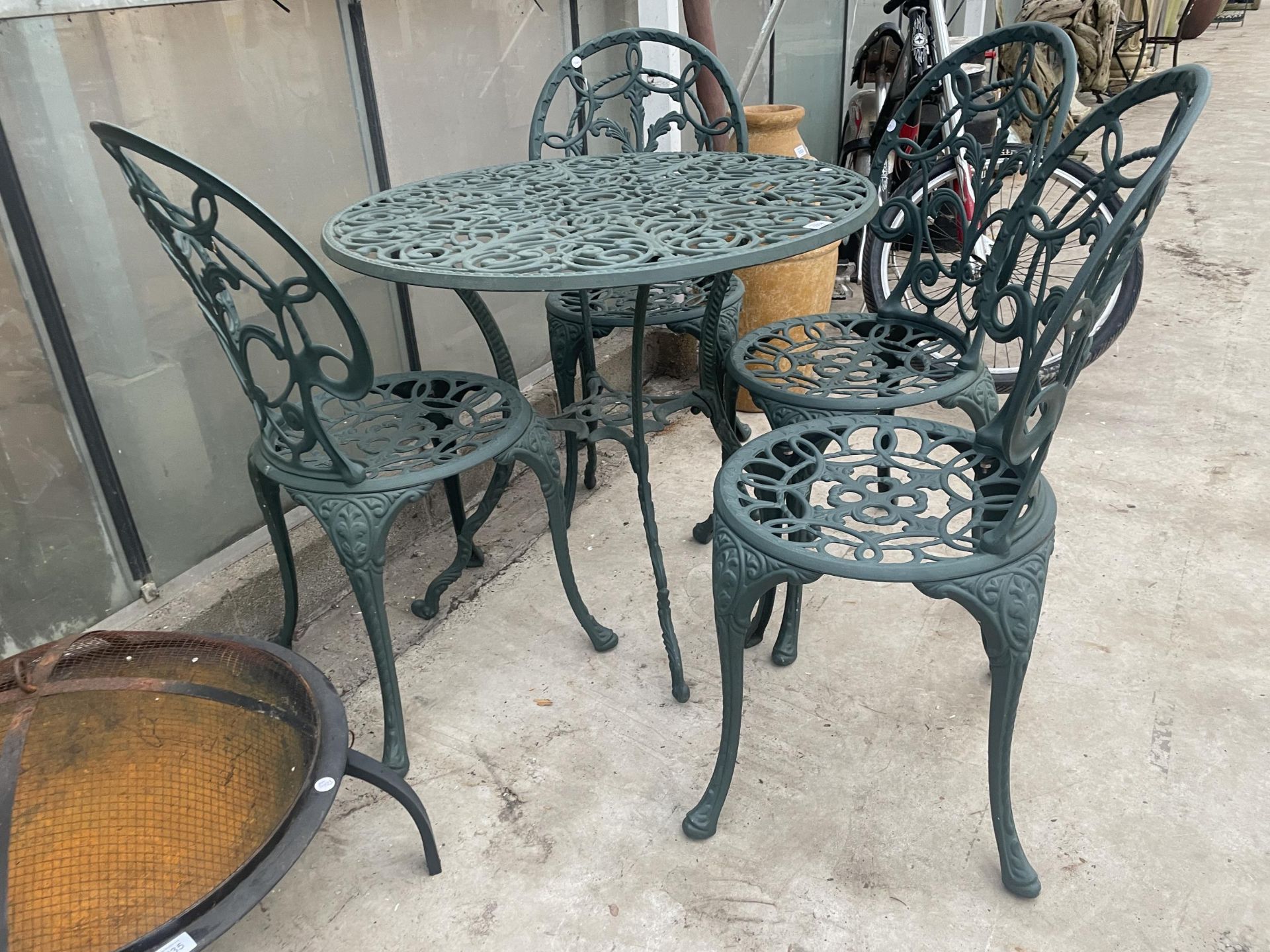 A VINTAGE STYLE GARDEN BISTRO SET COMPRISING OF A ROUND TABLE AND FOUR CHAIRS - Image 2 of 2