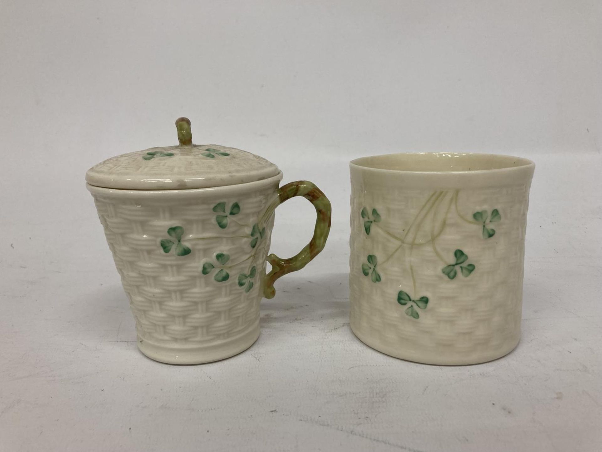 A BELLEEK IRISH SHAMROCK BASKETWEAVE LIDDED JAMPOT TOGETHER WITH A BASKETWEAVE MUG